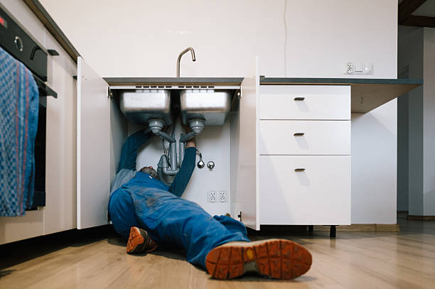 Professional Drain Cleaning technician working in Valencia, NM